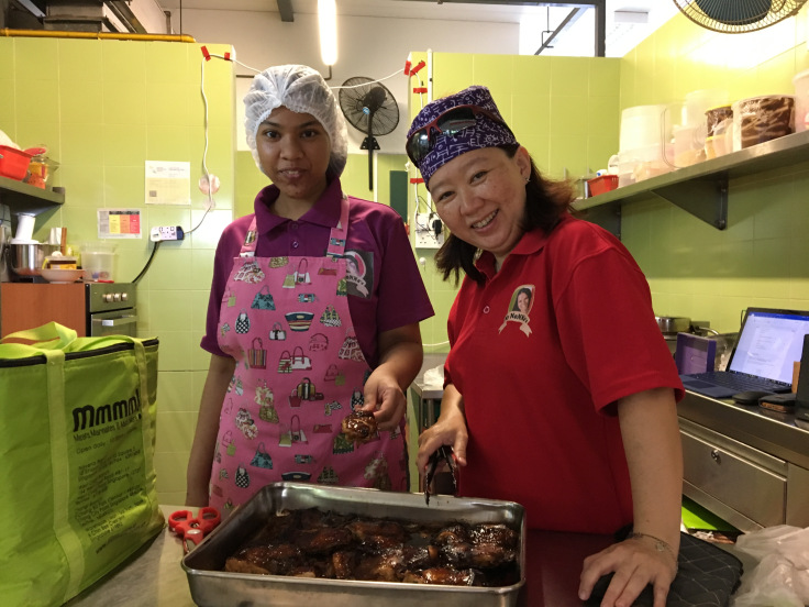 my-nonna_s-vendors-preparing-chicken-on-skewers-for-a-bento-delivery